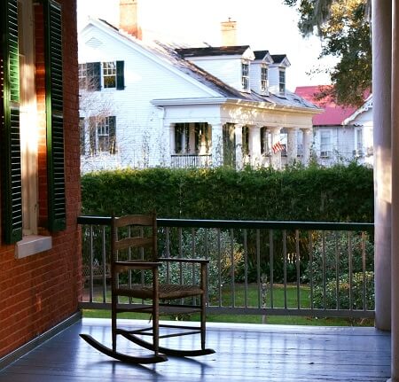 Rocking chair on balcony of Shadows on the Teche plantation home in New Iberia